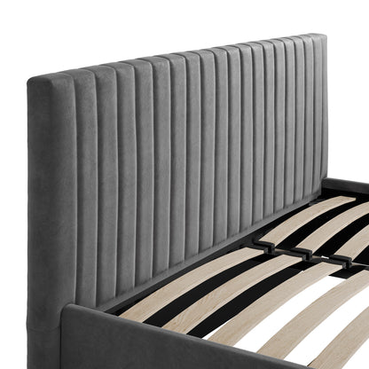Close-up of the Dublin Silver Upholstered 4ft6 Double Ottoman Bed, showcasing its tall, vertically ribbed gray headboard and exposed wooden slats without a mattress.