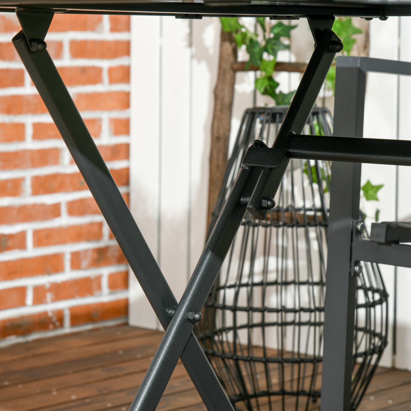 Nonila 110cm Black Steel And Glass Folding Outdoor Dining Table For 6