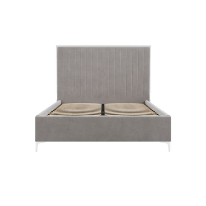 The Killarney Mink Upholstered 4ft6 Double Bed features a tall ribbed headboard and sturdy wooden slats, offering modern style and comfort in mink grey velvet??deal for enhancing any contemporary bedroom d?cor. Shown against a plain white background.