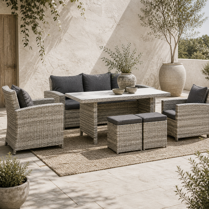 Vire Light Grey Rattan 7 Seater Outdoor Dining Set With Armchairs Footstools Glass Table And Cushions