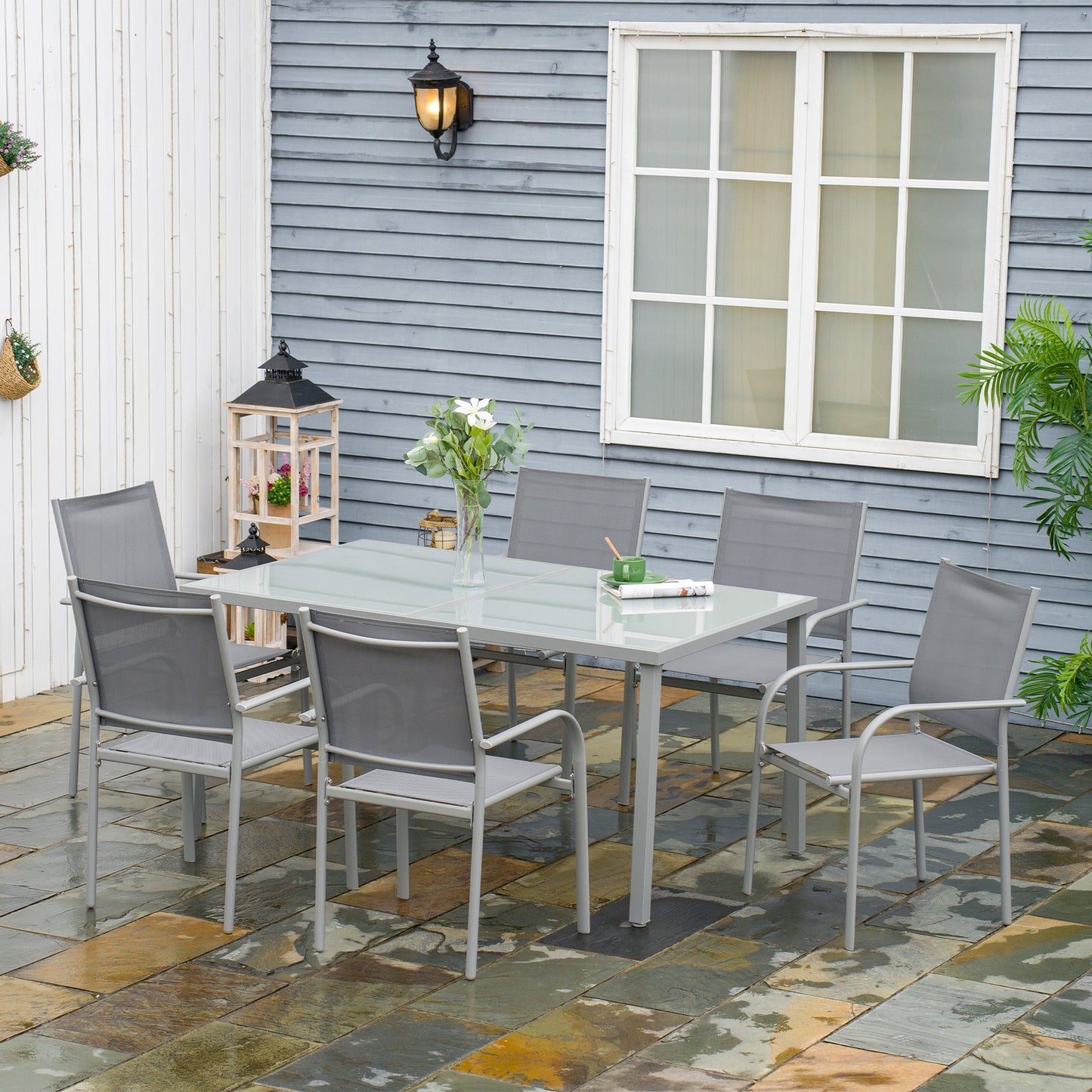 Mayoso 6 Seater Steel White and Grey Garden Dining Set With Glass Top Table And Stackable Chairs