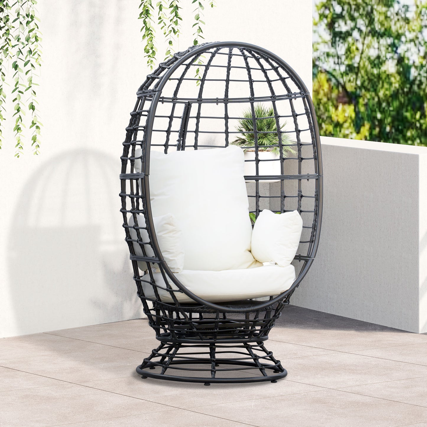 Rasu Rattan Black Swivel Egg Chair With White Cushion And Pillow