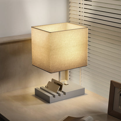Kata Wood And Fabric Grey Bedside Table Lamp With USB Charging Ports Phone Stands And Fabric Shade